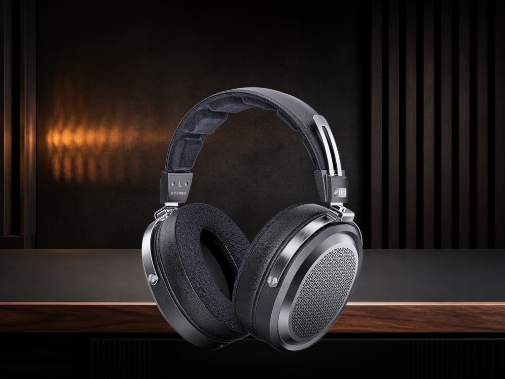 Official silver FiiO K17 desktop audio unit shown complete on a warm mineral background