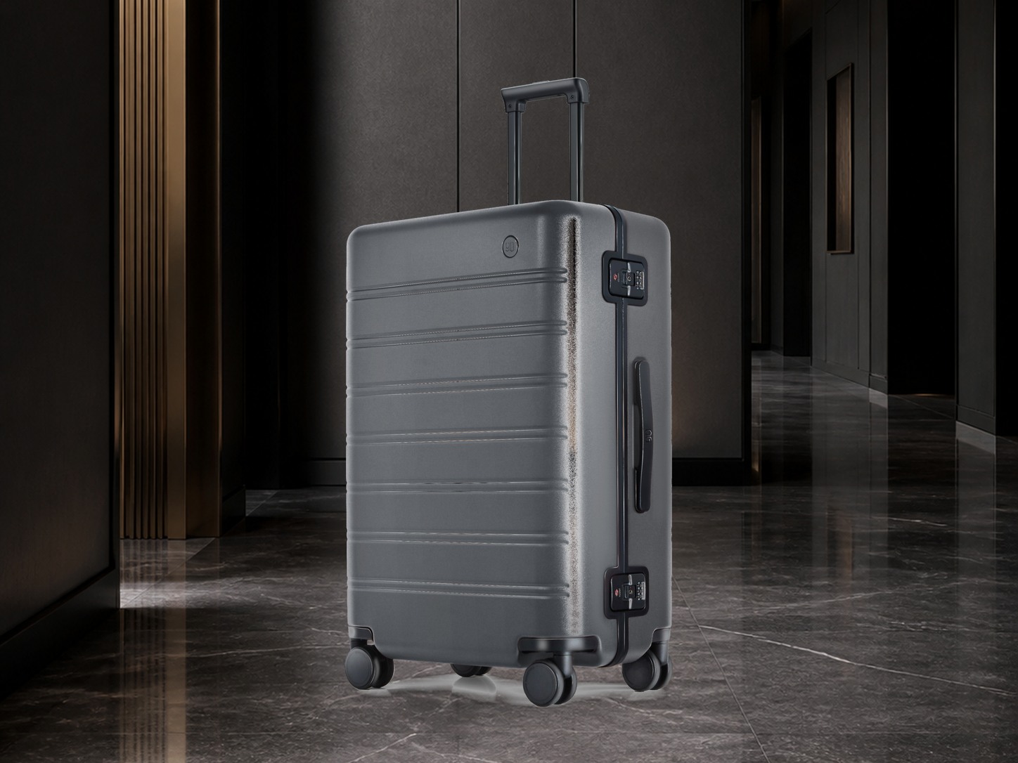 NINETYGO Manhattan Classic carry-on suitcase in a restrained travel setting