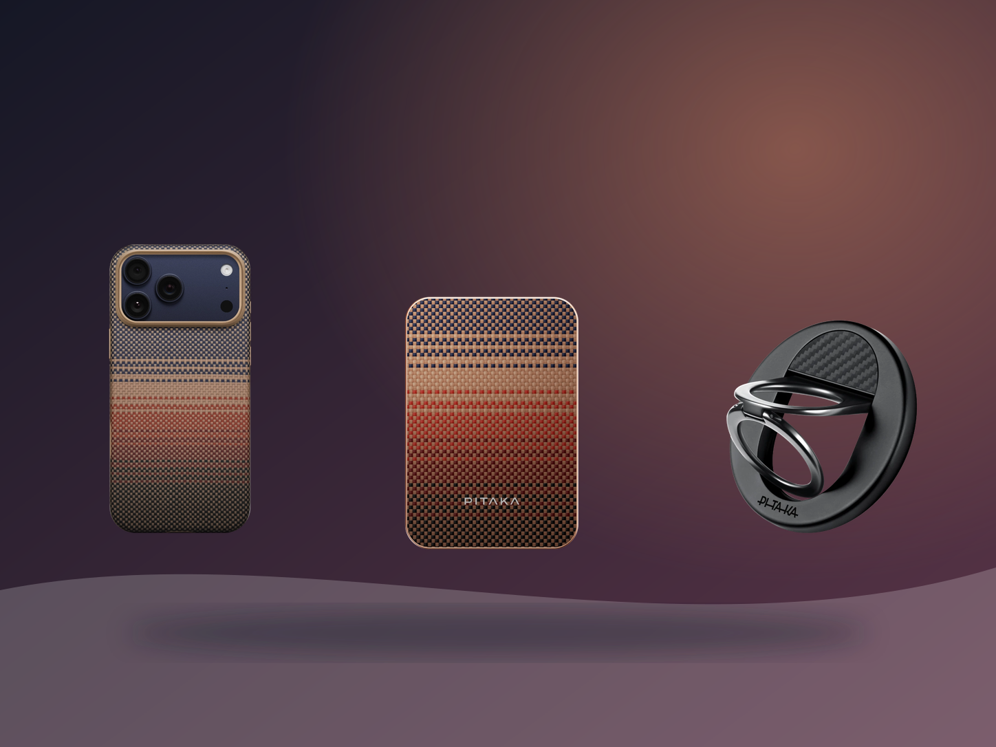 PITAKA Sunset Summa phone case, woven magnetic power bank and black MagEZ Grip arranged on a dark warm studio background