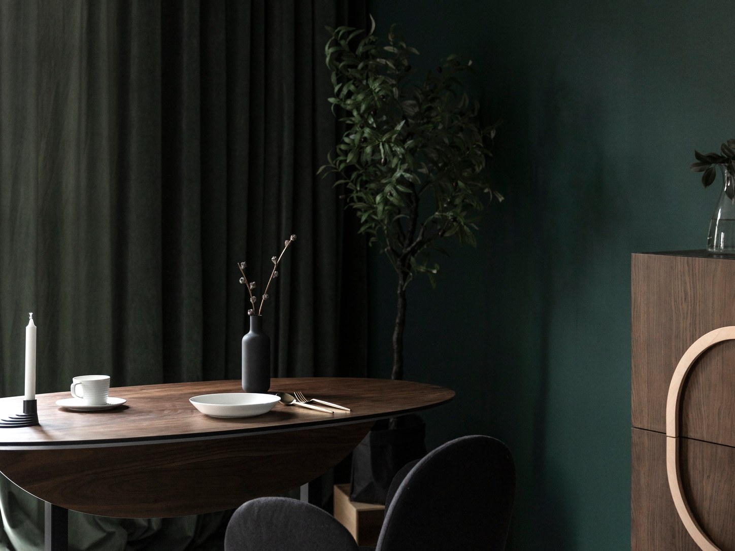 ziinlife Tree folding table shown fully open in a dark green dining interior