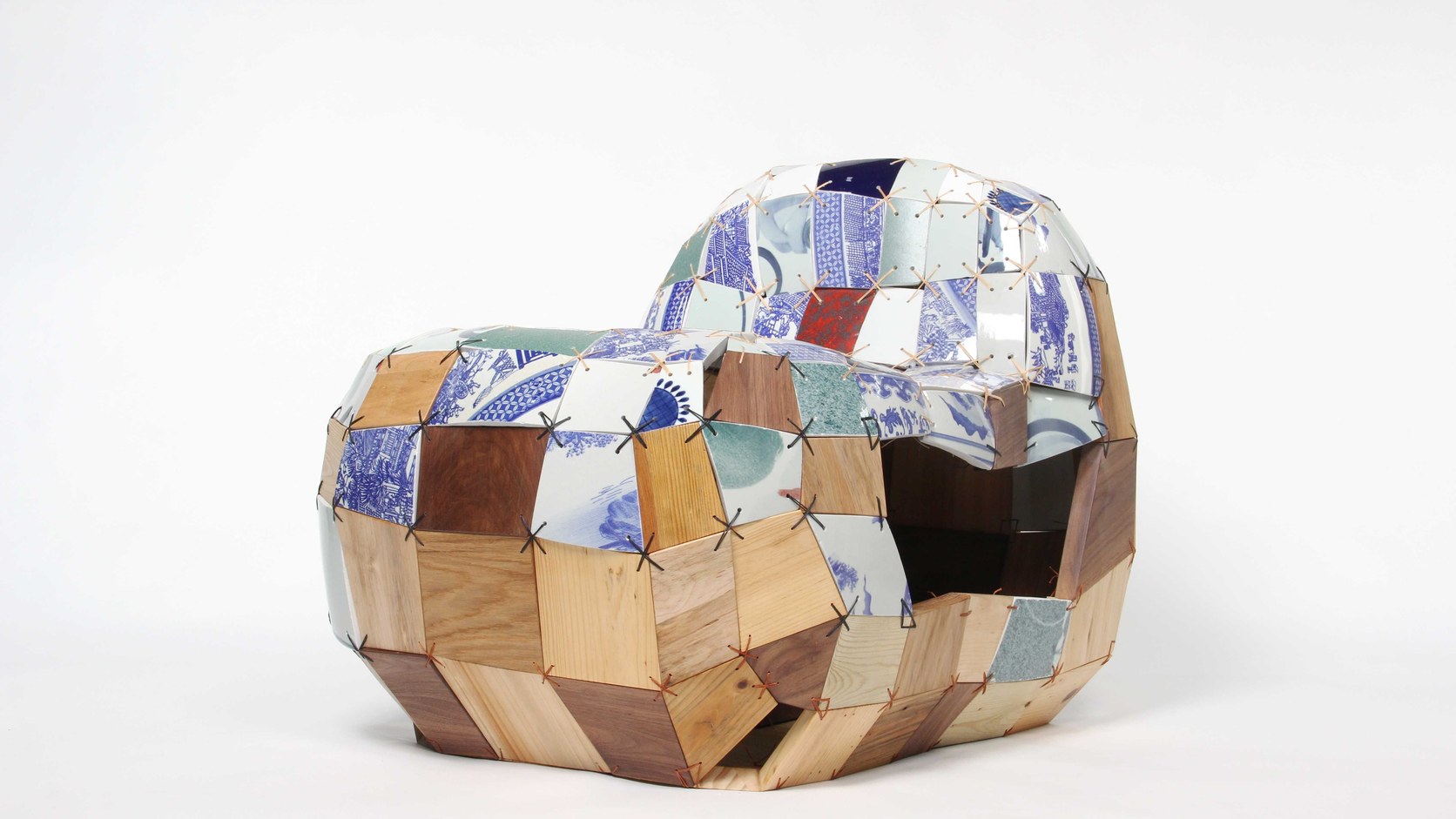 PINWU CEWO chair showing reclaimed ceramic and wood fragments joined by visible stitching