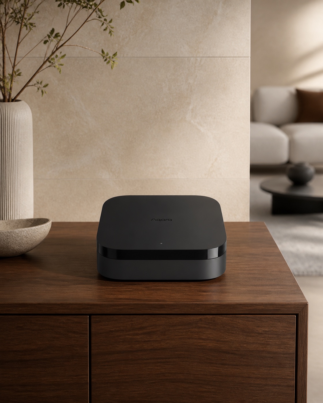 Complete black Aqara Hub M3 on a walnut sideboard in a warm modern living room