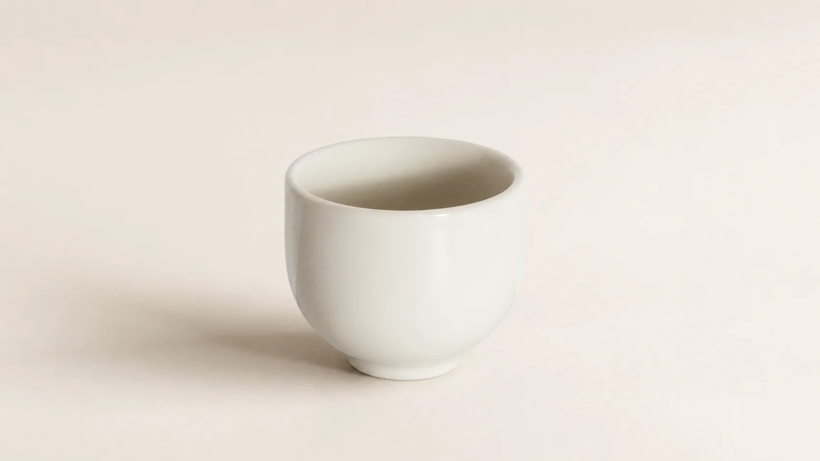 One complete Loveramics Pro Tea 145ml ivory porcelain Oriental Tea Cup in a wide editorial rendering