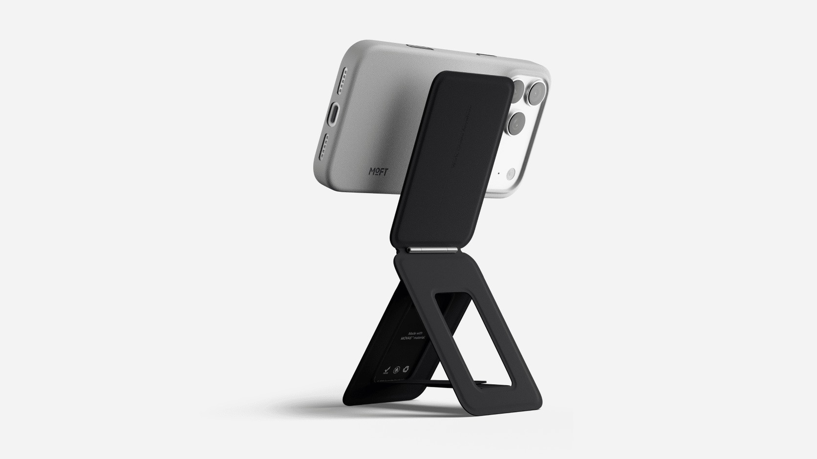 Wide view of the complete MOFT Snap Phone Tripod Stand MOVAS supporting a phone in landscape orientation
