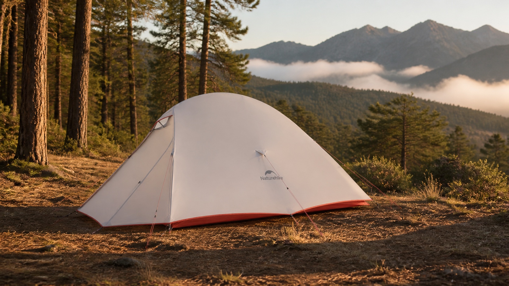Wide view of a complete grey and red Naturehike Cloud Up Pro 2 tent at a mountain forest campsite