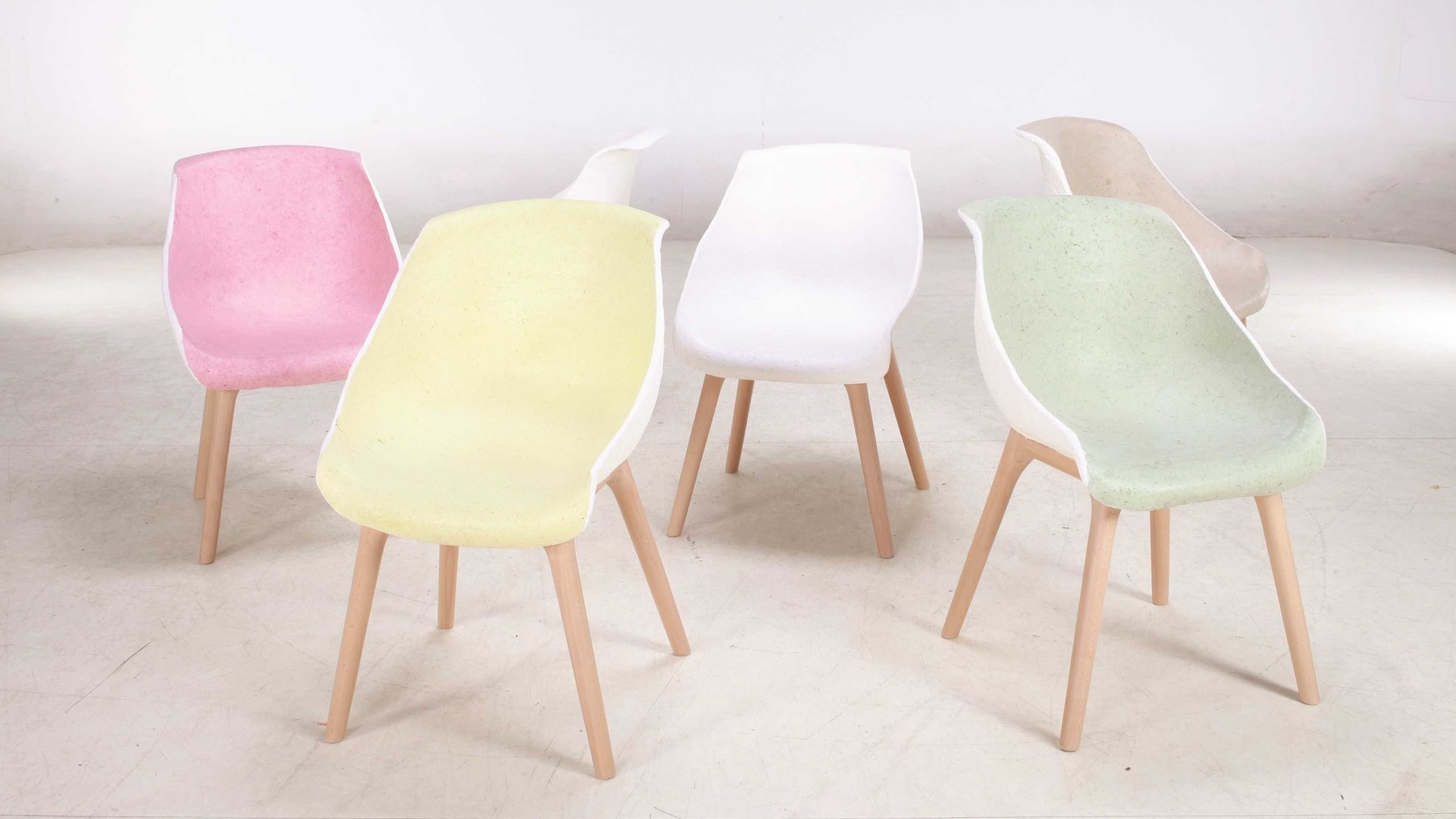Group of PINWU GU paper-pulp chairs in pale colour variations
