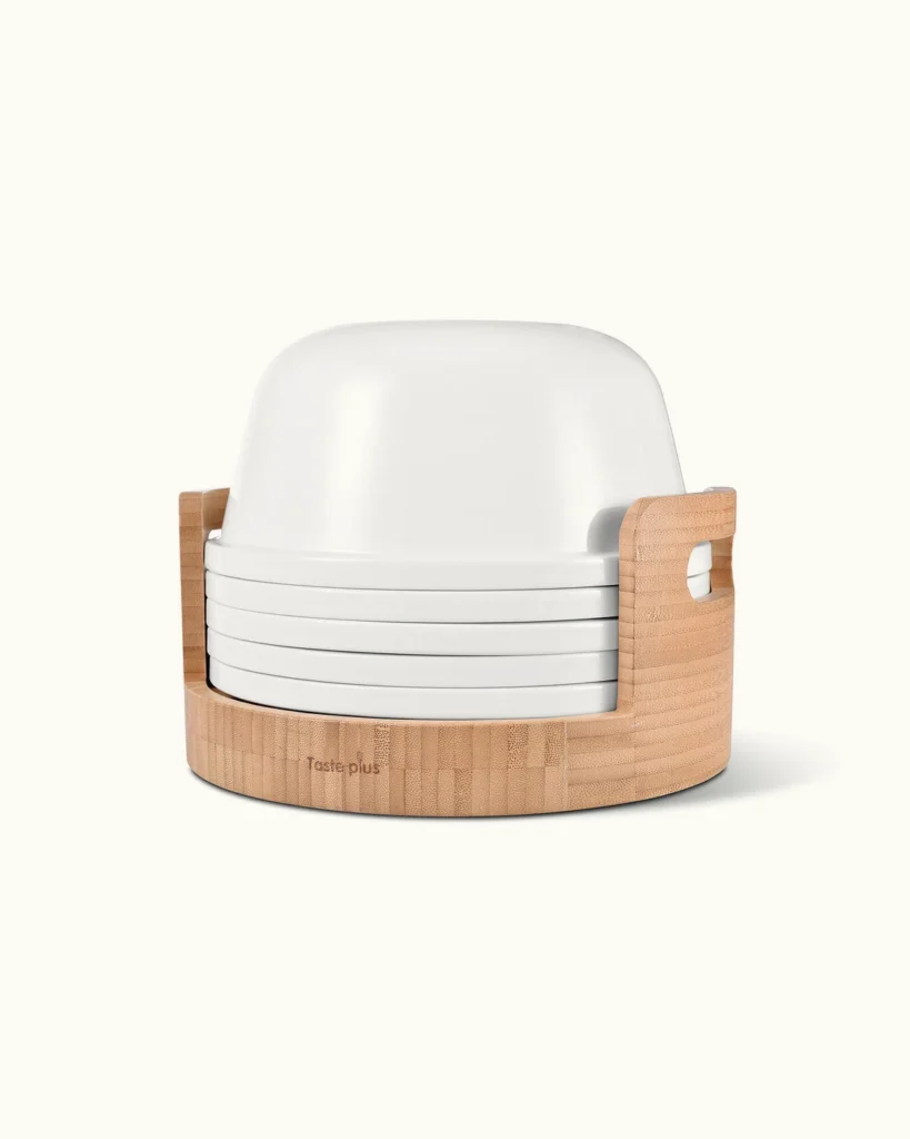 White Taste Plus 22-in-1 porcelain dining set nested in its bamboo storage base