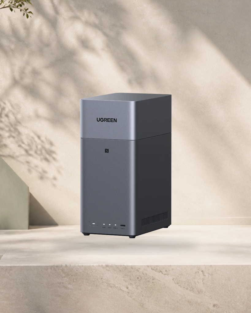 Dark grey UGREEN NASync DH2300 two-bay home NAS on a warm stone pedestal