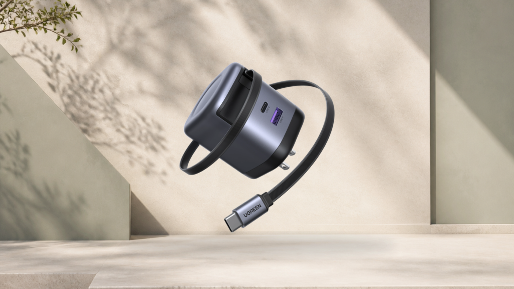 Wide view of the UGREEN Nexode 65W charger and retractable USB-C cable
