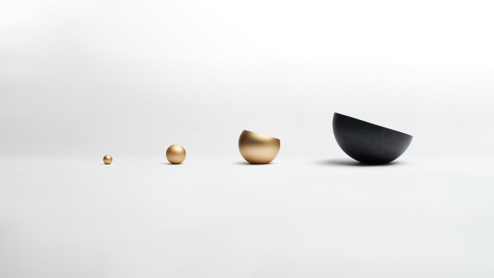 Wide official arrangement of complete gold and black WUU SHELL vessels on a light background