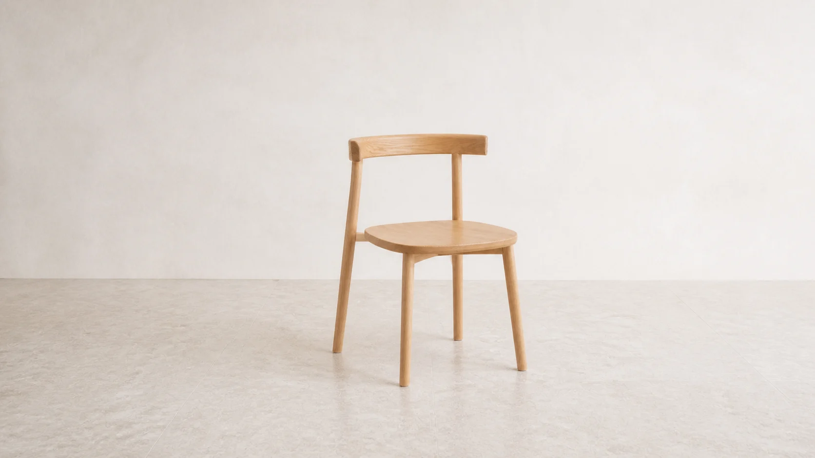 Wide studio view of the natural white-ash ZAOZUO Mon Chair showing its low back and grain