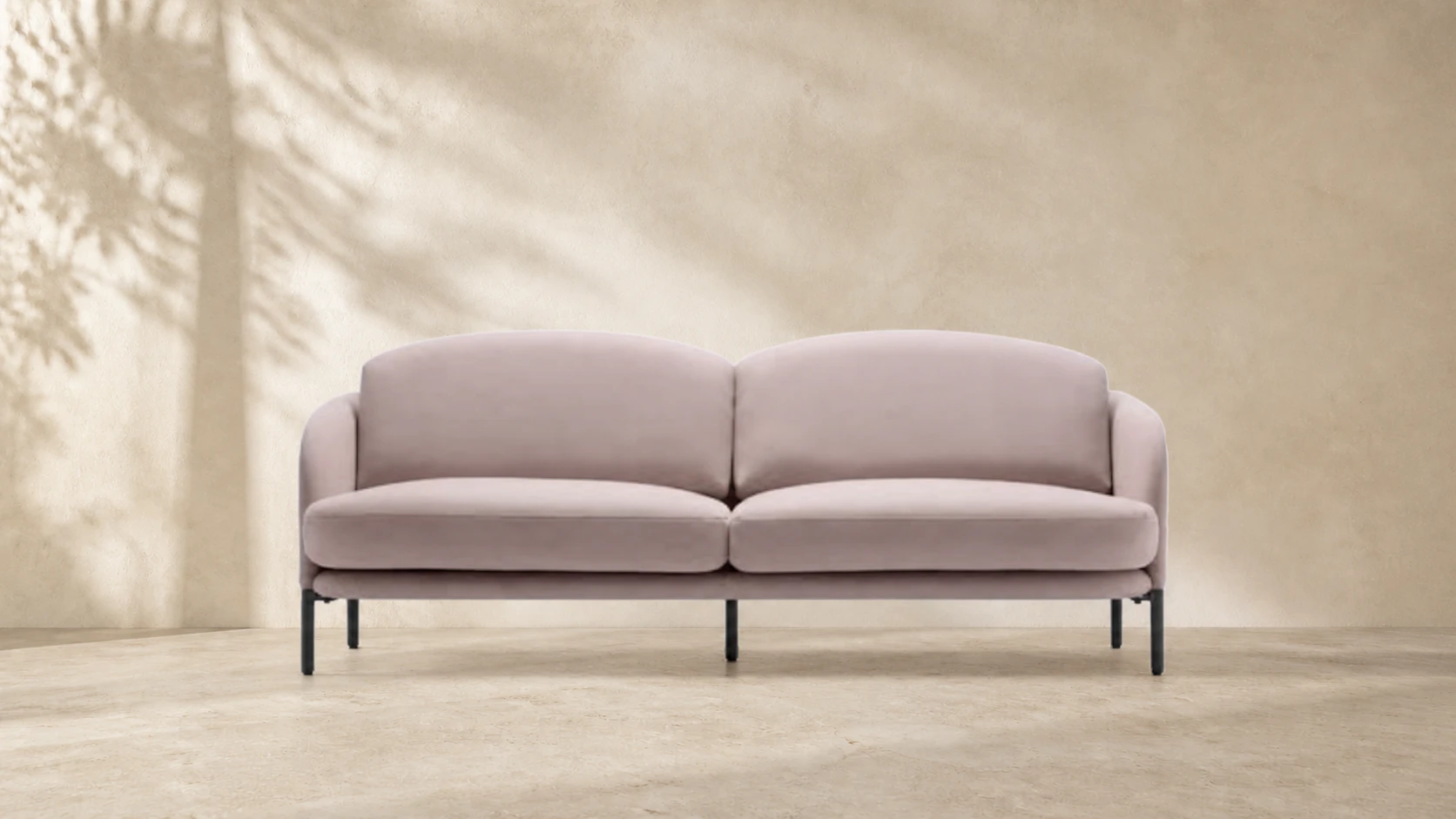 Full front view of the pale blush three-seat ZAOZUO Plume Sofa by Jonas Wagell
