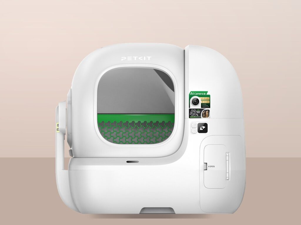 Passive pet objects and connected cat-care appliances shown in a domestic editorial composition
